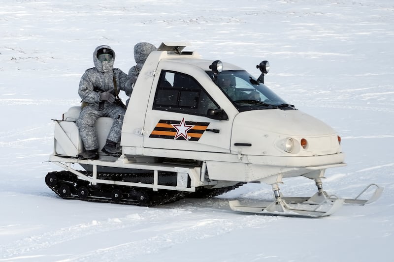 A Russian military snowmobile moves on Kotelny Island in the Arctic region.