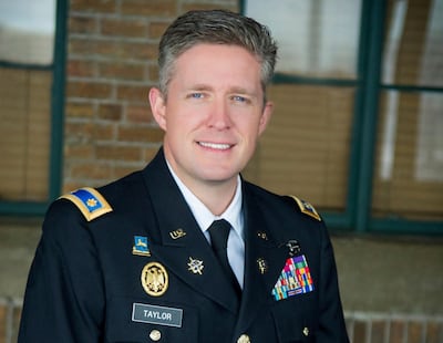 This undated photo provided by the Utah National Guard shows Maj. Brent Taylor of the Utah National Guard. Taylor, mayor of North Ogden, died in Afghanistan on Saturday, Nov. 3, 2018, City Councilman Phillip Swanson said. Taylor was deployed to Afghanista