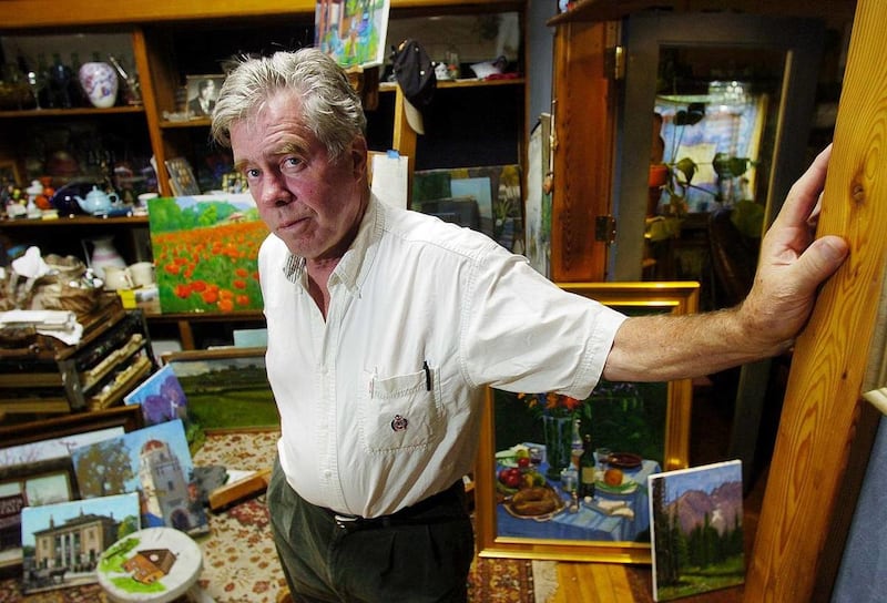Sugar House resident and painter Ken Baxter poses in his home and studio surrounded by his works in 2005. Ken in his early life painted historical city scapes along with the beauty of nature.