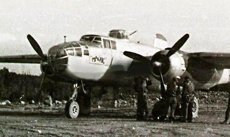 This undated photo provided by the 57th Bomb Wing Association shows a U.S. B-25 Mitchell bomber nicknamed “Maybe.” The plane crashed into a mountain in northern Italy during a bombing mission on Feb. 6, 1945. The two pilots were killed, but they kept the