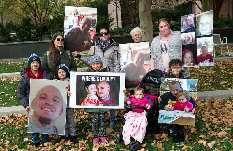 Family members of Levi Collins and Danny “Kiko” Gallegos gather before holding a vigil outside the Gallivan Center in Salt Lake City on Tuesday, Nov. 1, 2016. Tuesday marked the second anniversary of the disappearance of Levi Collins, Danny “Kiko” Gallego