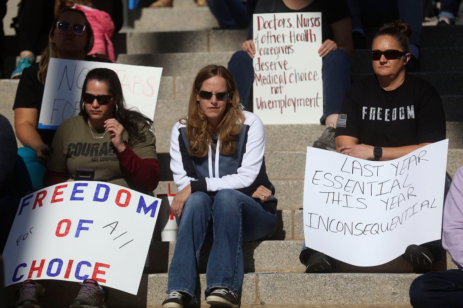 Protesters oppose a vaccine mandate outside of the Capitol in Salt Lake City.