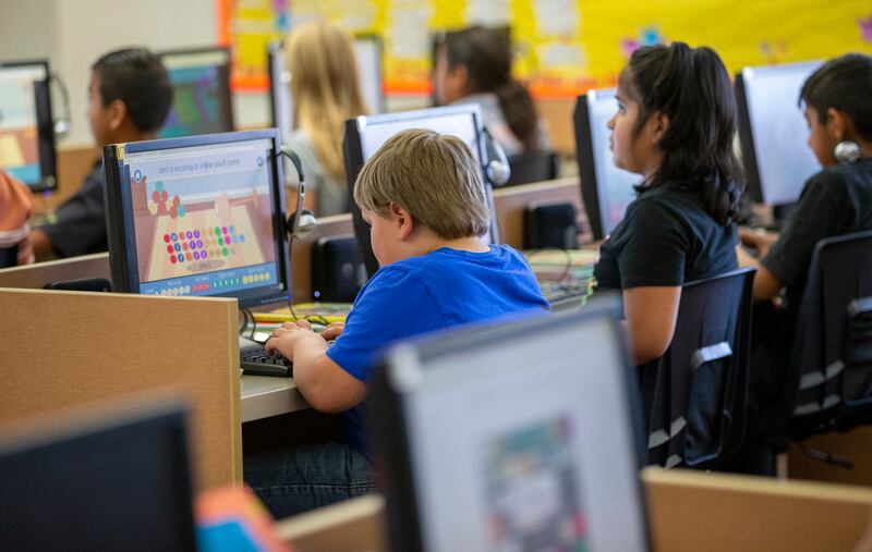 Students work on computers at Beaver School District’s Belknap Elementary School.