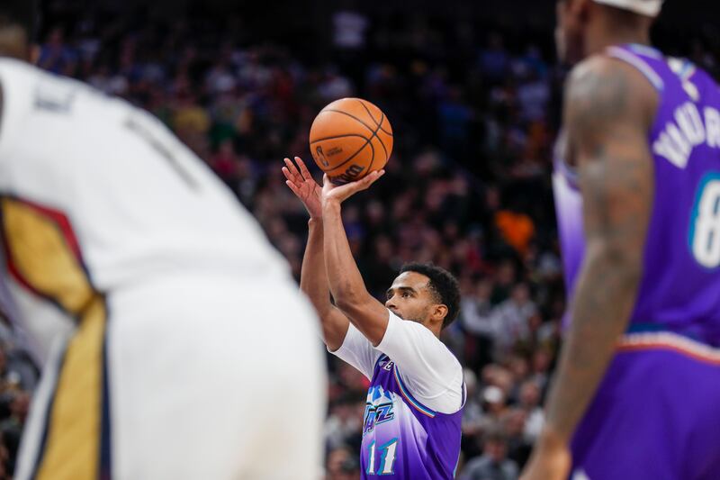 The Utah Jazz Mike Conley shoots a free throw while playing the New Orleans Pelicans in Salt Lake City on Thursday, Dec. 15, 2022. The Jazz won in over time 132-129.