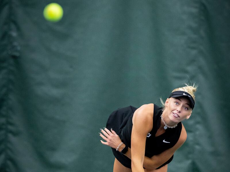 BYU player serves against Washington in match during the 2022-23 season. This coming season, as members of the Big 12, the Cougars will have their hands full.