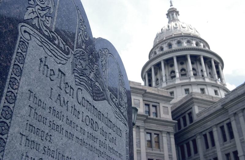 This 5-foot tall stone slab bearing the Ten Commandments stands near the Capitol in Austin, Texas, in this July 29, 2002, file photo. The Supreme Court could clarify some elements of religious protection in the First Amendment in 2019.