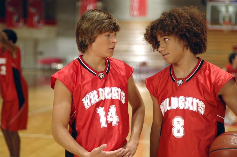 Disney Channel Original Movie "High School Musical" tells the story of two high school students — Troy (Zac Efron), pictured left, a popular basketball player and Gabriella (Vanessa Anne Hudgens), a shy, brainy newcomer — who share a secret passion for si