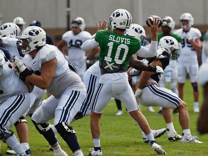 BYU’s Kedon Slovis throws the football during practice in Provo on Tuesday, Aug. 8, 2023.