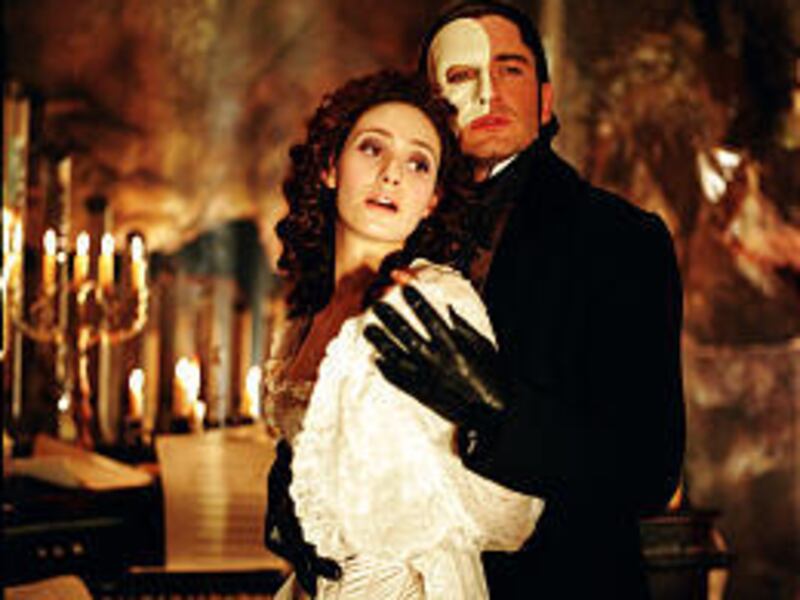Emily Rossum as Christine and Gerard Butler as the title character in "The Phantom of the Opera."