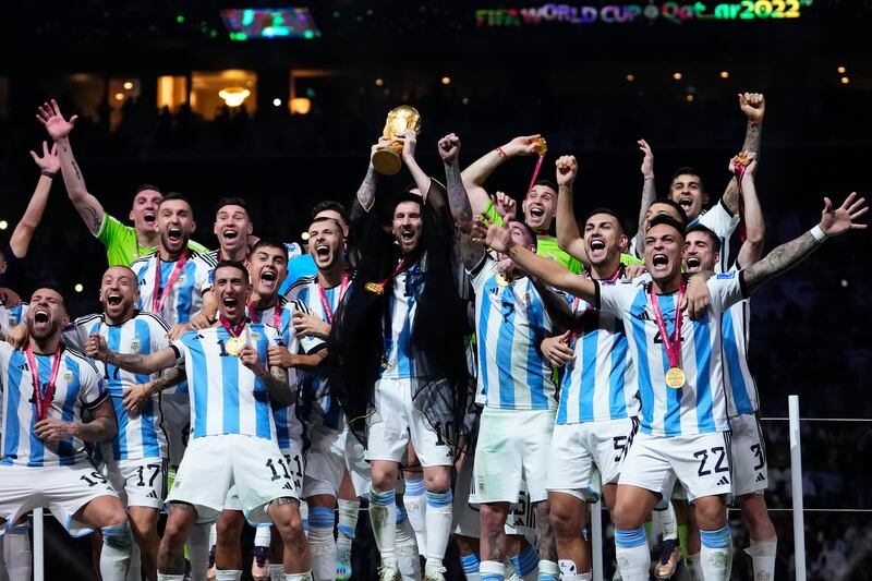 Argentina celebrates after winning the World Cup final soccer match against France, Sunday, Dec.18, 2022.