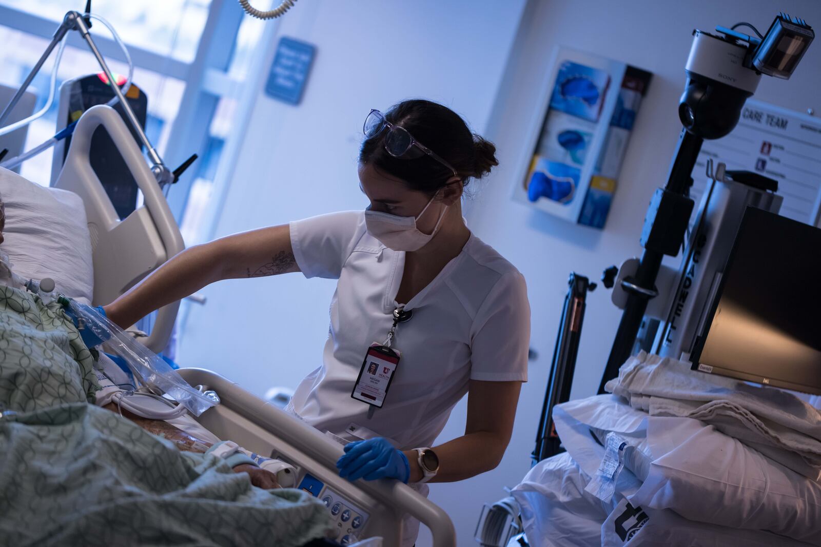 A University of Utah Health worker treats patients.