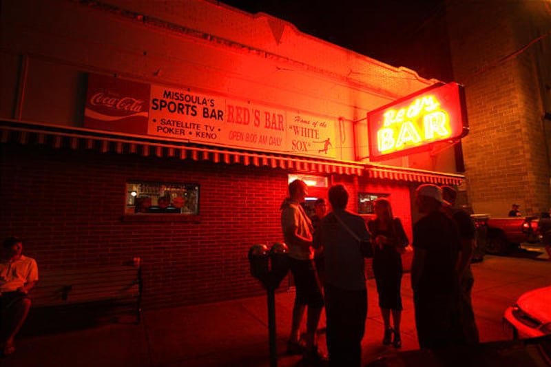 People hang around a bar in Missoula, Mont., where drunken driving is "part of the culture."