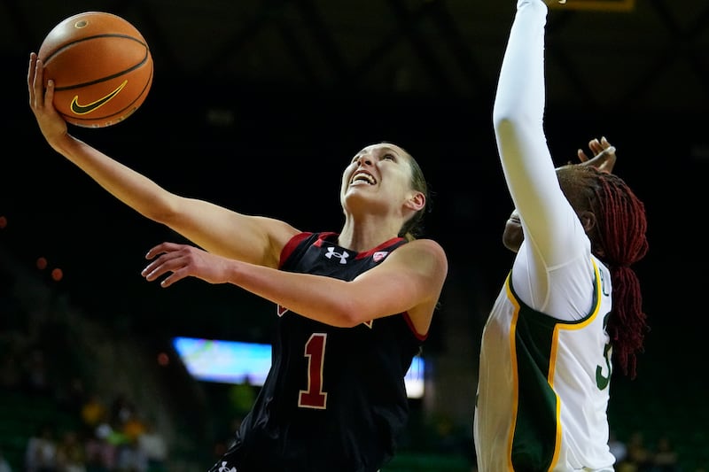 Utah’s Isabel Palmer (1) goes up for a shot against Baylor’s Aijha Blackwell during the first half of an NCAA college basketball game, Tuesday, Nov. 14, 2023, in Waco, Texas.