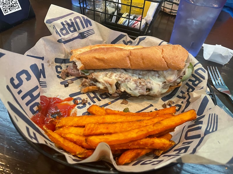 A Philly cheesesteak and fries was the menu item of choice during the author's visit to Murph's in Atlanta.