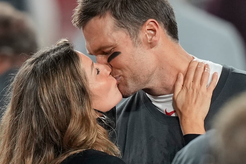 Tampa Bay Buccaneers quarterback Tom Brady kisses wife Gisele Bundchen after winning Super Bowl 55 Sunday, Feb. 7, 2021, in Tampa, Fla.
