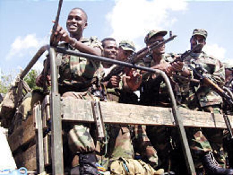 Ethiopian army soldiers leave the Presidential Palace in Mogadishu after handing over security to African Union troops.