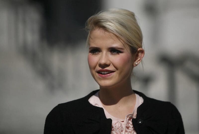 Elizabeth Smart speaks on the south steps of the state Capitol in Salt Lake City on Nov. 14, 2011. Utah Congressman-elect Chris Stewart is now writing her memoir.