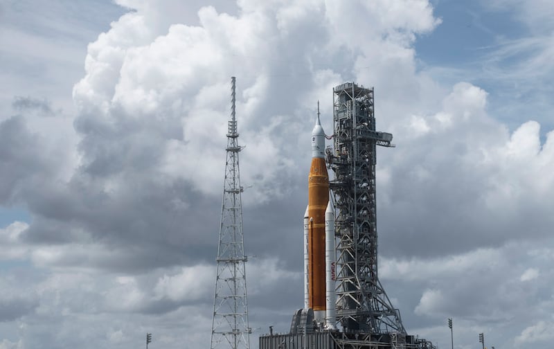 NASA’s Space Launch System rocket with the Orion spacecraft aboard is seen atop the mobile launcher.