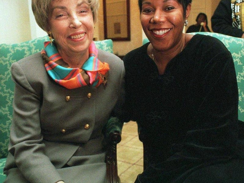 FILE - In this Jan. 16, 1998 file photo, Barbara Henry, a former teacher at William Frantz Elementry school in New Orleans, left, and her 1960 first grade student Ruby Bridges-Hall, pose for a portrait in Boston. Ruby Bridges will be one of the presenting