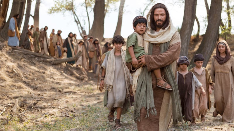 Followers walk with Jesus in this image from the Bible Videos.