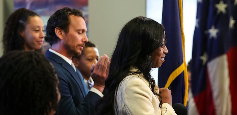 FILE - Surrounded by her family Rep. Mia Love talks about election results in the 4th Congressional District at the Utah Republican Party offices in Salt Lake City on Monday, Nov. 26, 2018.