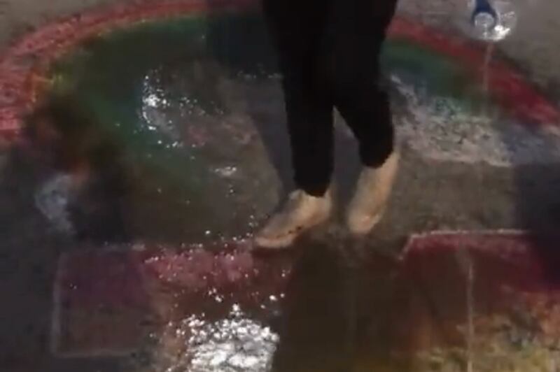 BYU condemned a homophobic slur uttered by a student who also used water to wash away rainbow chalk art at the edge of campus.