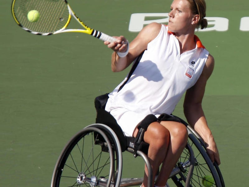 FILE - In this Sept. 15, 2008, file photo, Esther Vergeer of the Netherlands, returns a shot during the wheelchair tennis women's doubles open final at the Beijing 2008 Paralympic Games in Beijing, China. After more than 13 years at No. 1 in the wheelchai