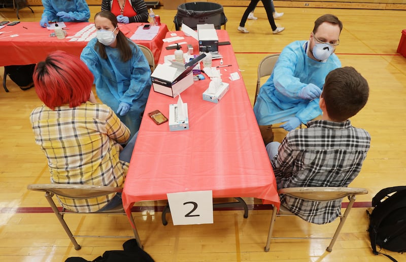 Viewmont High School students are tested for COVID-19 at the school in Bountiful.