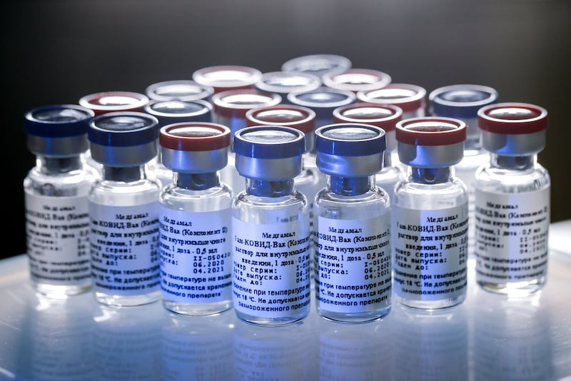 In this handout photo taken on Thursday, Aug. 6, 2020, and provided by Russian Direct Investment Fund, a new vaccine is on display at the Nikolai Gamaleya National Center of Epidemiology and Microbiology in Moscow, Russia.