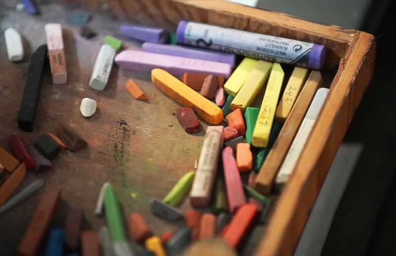Pastels used by Utah artist JR Johansen are pictured as he creates a portrait for the family of a deceased Latter-day Saint missionary.