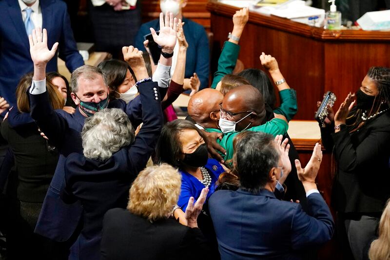 House Democrats celebrate at the Capitol.