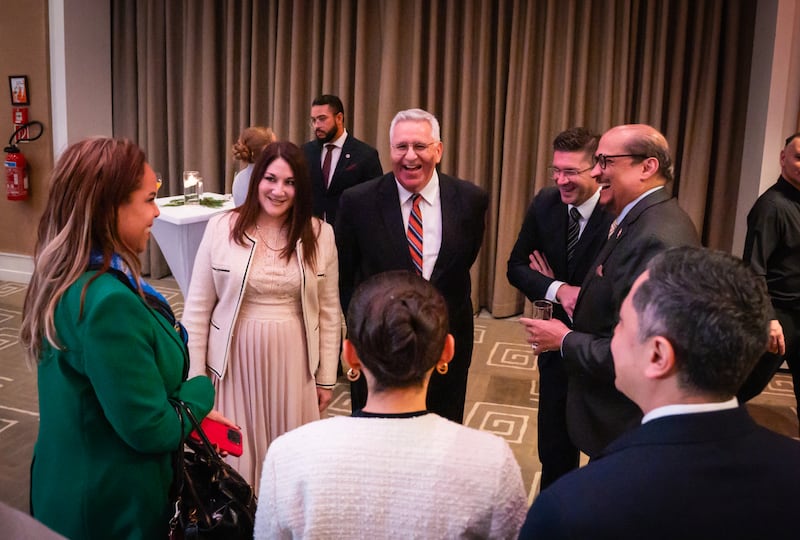 Elder Rubén V. Alliaud, president of the church's Europe Centra Area, and his wife, Sister Fabiana Alliaud, greet guests at the first-ever Light the World dinner hosted by The Church of Jesus Christ of Latter-day Saints in Geneva, Switzerland, on Tuesday, Dec. 2, 2025.