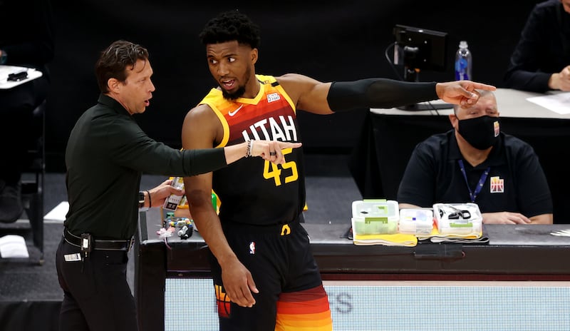 Utah Jazz coach Quin Snyder talks with Donovan Mitchell in Salt Lake City.