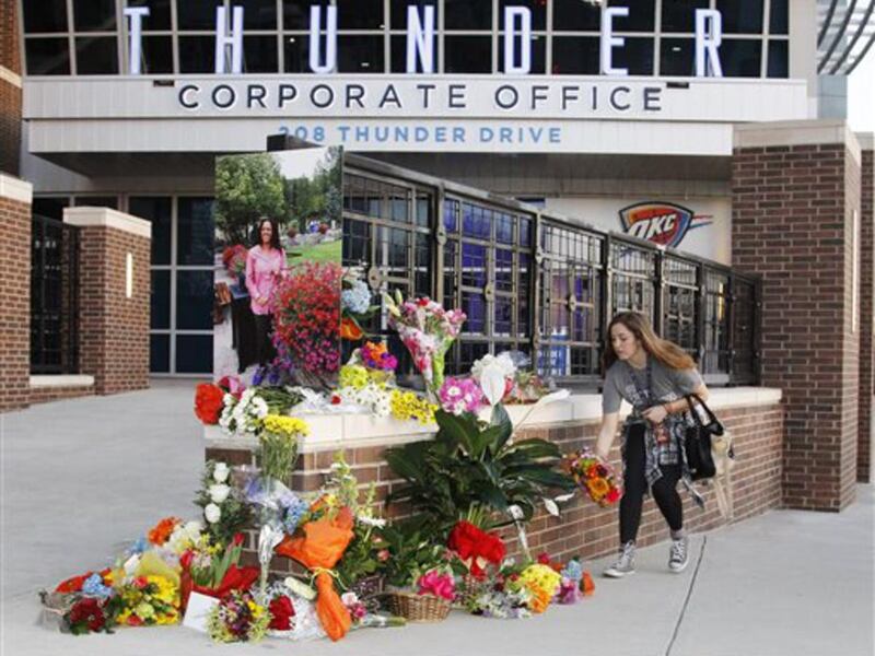 Rebekah Murphy drops off flowers at a memorial for Ingrid Williams, the wife of Thunder assistant coach Monty Williams, who died Wednesday as the result of a car accident Tuesday, before an NBA basketball game between the New Orleans Pelicans and the Okla