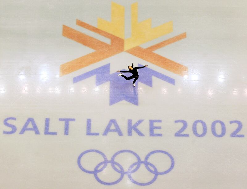 FILE - This Feb. 8, 2002, file photo, shows U.S. champion Michelle Kwan practicing for the women's short program for the Winter Olympic Games at the Salt lake Ice Center in Salt Lake City. Salt Lake City got the green light to bid for an upcoming Winter O
