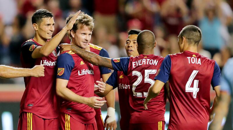 Real Salt Lake midfielder Nick Besler (13) celebrates a goal with teammates as Real Salt Lake and New York City FC play at Rio Tinto Stadium in Sandy on Saturday, Aug. 3, 2019. RSL won 3-1.