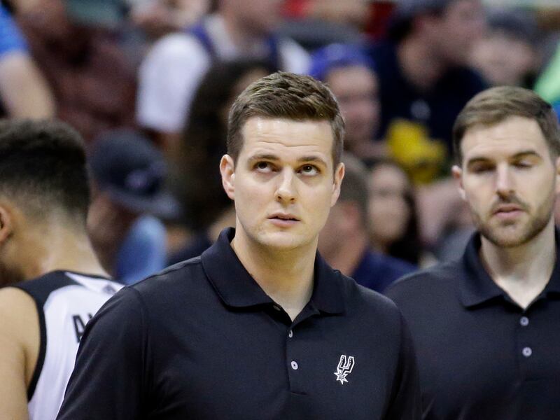 San Antonio Spurs coach Will Hardy looks at the scoreboard during an NBA summer league basketball game in July 2016.