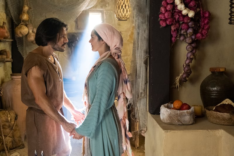 Shahar Isaac, who plays Simon Peter, speaks with Lara Silva, who plays Simon’s wife Eden, in a scene from Season 3 of “The Chosen.”