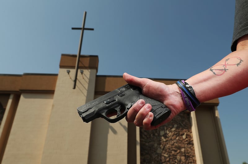 Connie Peterson stands outside the Salt Lake Christian Center where she attends church in Millcreek on Wednesday, Aug. 1, 2018. Peterson has a concealed gun during worship.