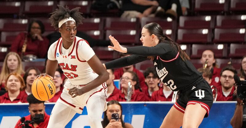 Indiana forward Lilly Meister (52) defends against Utah forward Maye Toure (21) during the first half in the first round of the NCAA college basketball tournament, Friday, March 21, 2025, in Columbia, S.C.