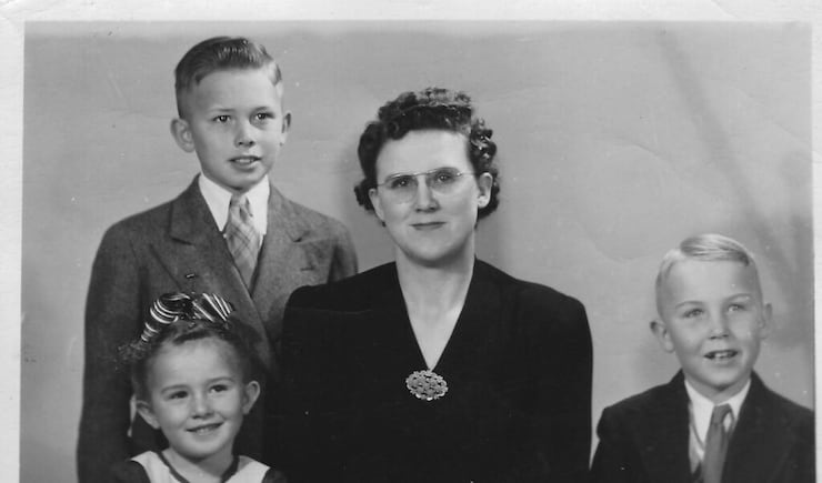 President Dallin H. Oaks with his mother, Stella, brother Merrill and sister Evelyn. President Oaks’ father died when he was 7 years old, and his mother raised three children on her own.