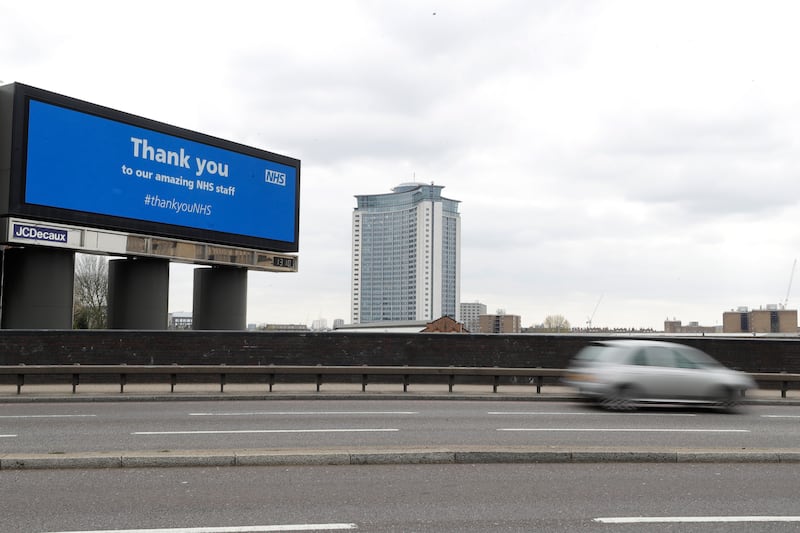 A large advertising display on the main road heading west out of central London, Wednesday, April 1, 2020, in support of the National Health Service staff as they fight the ongoing coronavirus outbreak.