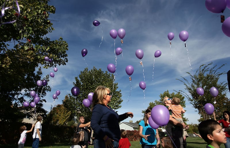 Purple balloons are released in honor of Susan Powell's 30th birthday at West View Park in West Valley on Saturday, October 15, 2011.