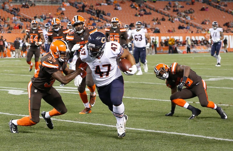 Chicago Bears running back Paul Lasike (47) runs the ball against Cleveland Browns defensive back Don Jones (35) during the second half of an NFL preseason football game, Thursday, Sept. 1, 2016, in Cleveland. (AP Photo/Ron Schwane)