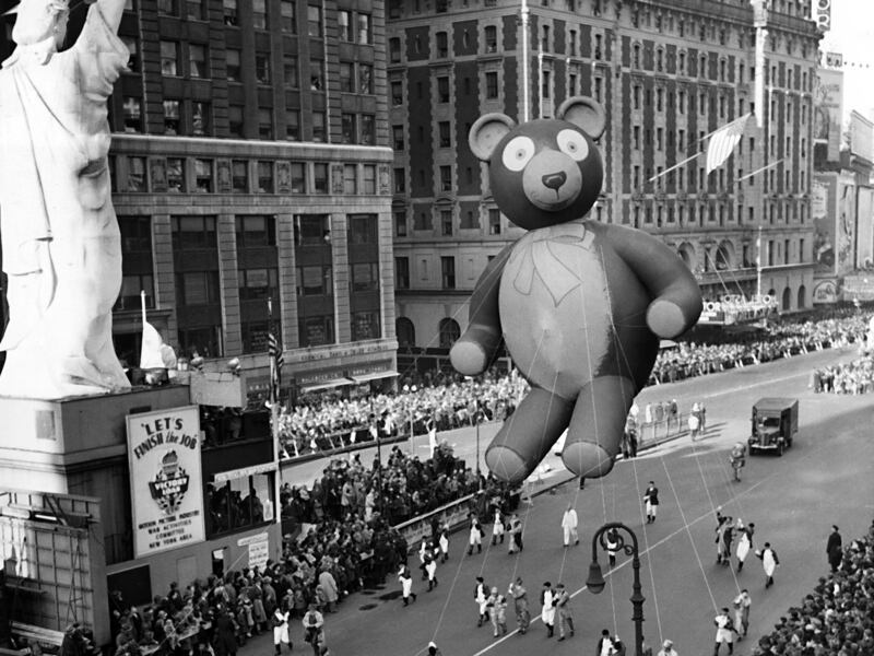In this Nov. 23, 1945 file photo a float is paraded through New York’s Times Square during the annual Macy’s Thanksgiving Day Parade, the first parade since the festivities were suspended during World War II.