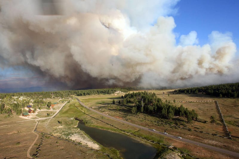 Crews battle the Shingle Fire east of Cedar City and near the Duck Creek Village Monday, July 2, 2012.