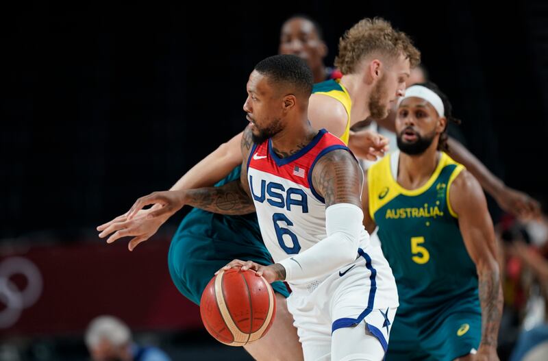 Damian Lillard drives around Jock Landale