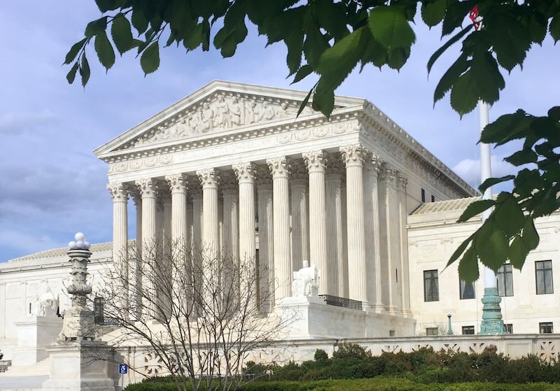 In this April 23, 2018 file photo, the Supreme Court in Washington. The Supreme Court has struck down a federal law that bars gambling on football, basketball, baseball and other sports in most states, giving states the go-ahead to legalize betting on spo