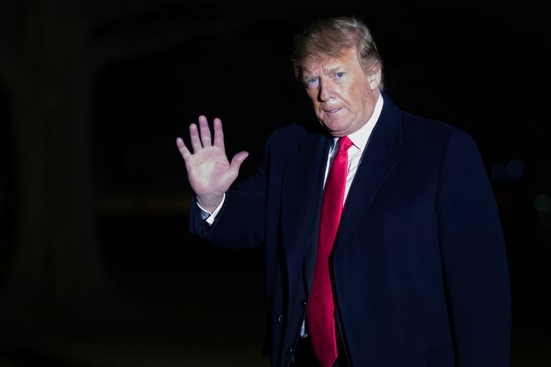 FILE - In this Sunday, Feb. 3, 2019, file photo, President Donald Trump waves after stepping off Marine One on the South Lawn of the White House in Washington. Federal prosecutors in New York have issued a subpoena seeking documents from Trump's inaugural