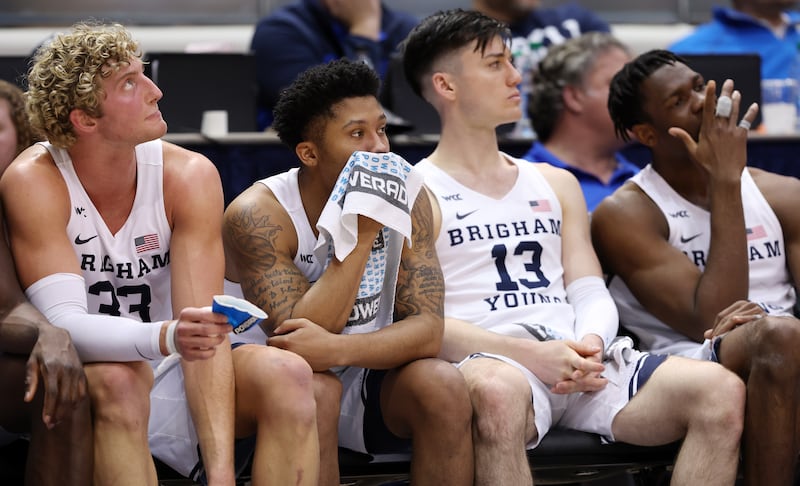 BYU’s Caleb Lohner (33), Te’Jon Lucas (3), Alex Barcello (13) and Atiki Ally Atiki (4) watch from the bench.